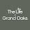 The Life at Grand Oaks logo